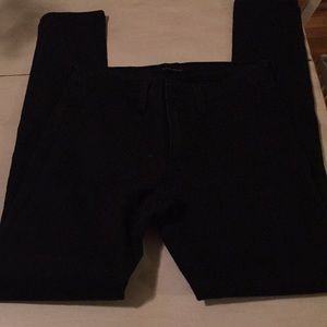 Women’s black jeggings.